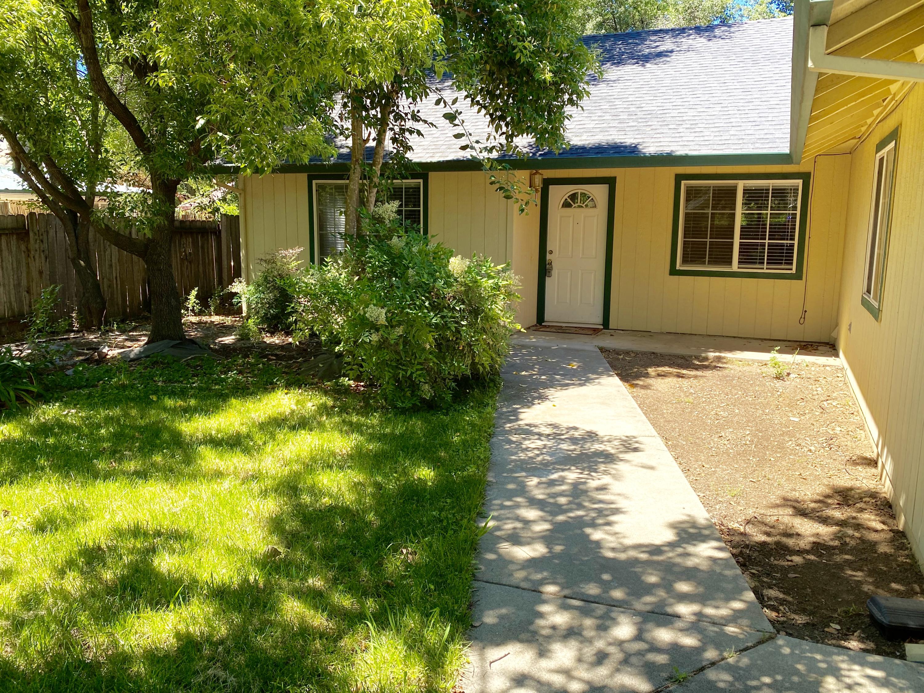5378 Cedars Road Redding, CA 96001 - Photo 2 of 23 a view of backyard of the house