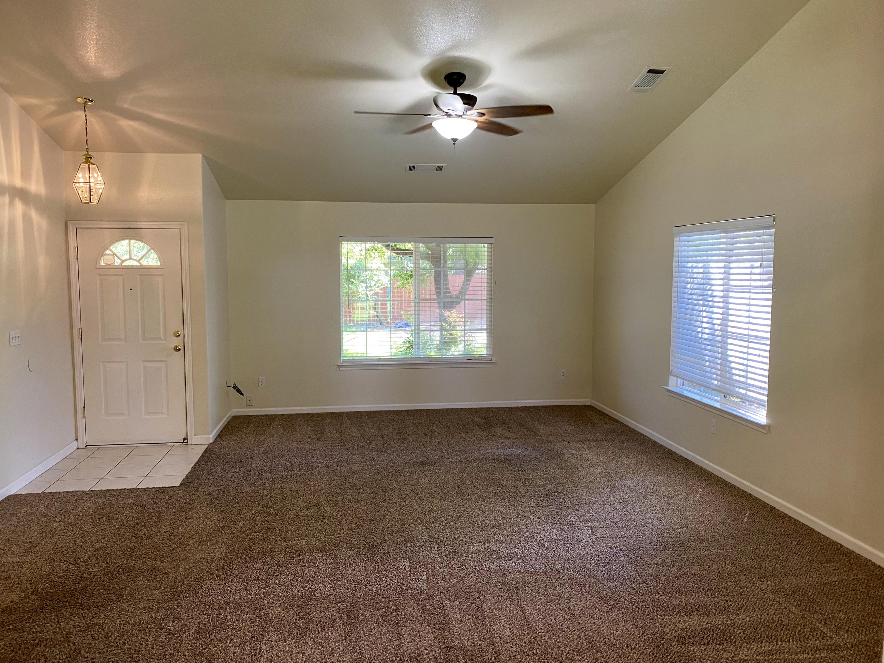 5378 Cedars Road Redding, CA 96001 - Photo 5 of 23 a view of an empty room with a window
