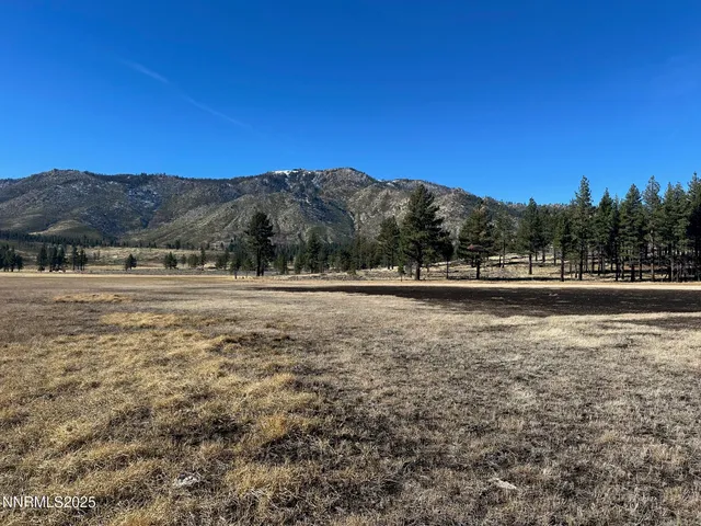 a view of a lake with a mountain in the background