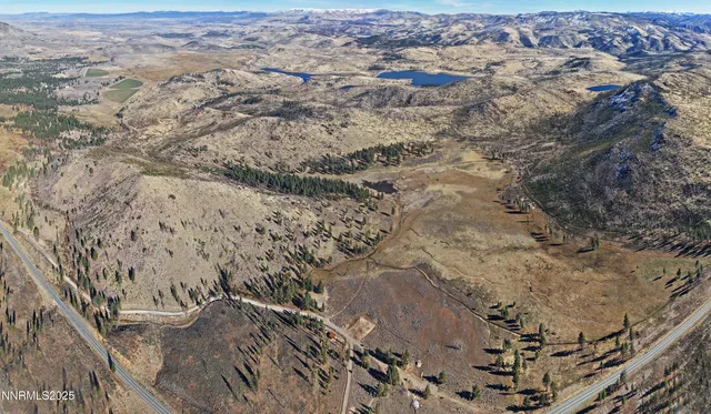 a view of lake with mountain
