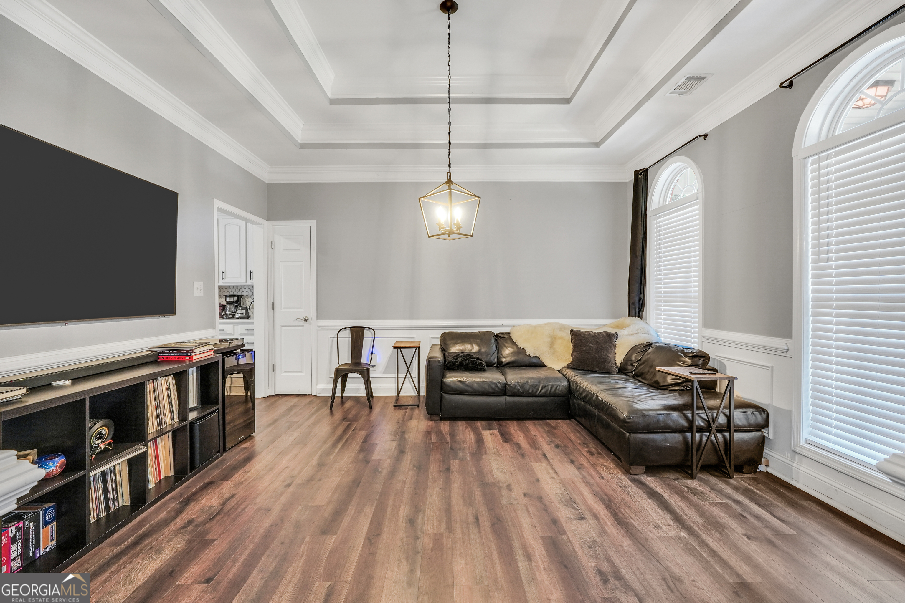 261 Highway 85 Connector Brooks, GA 30205 - Photo 16 of 73 a living room with furniture and a flat screen tv