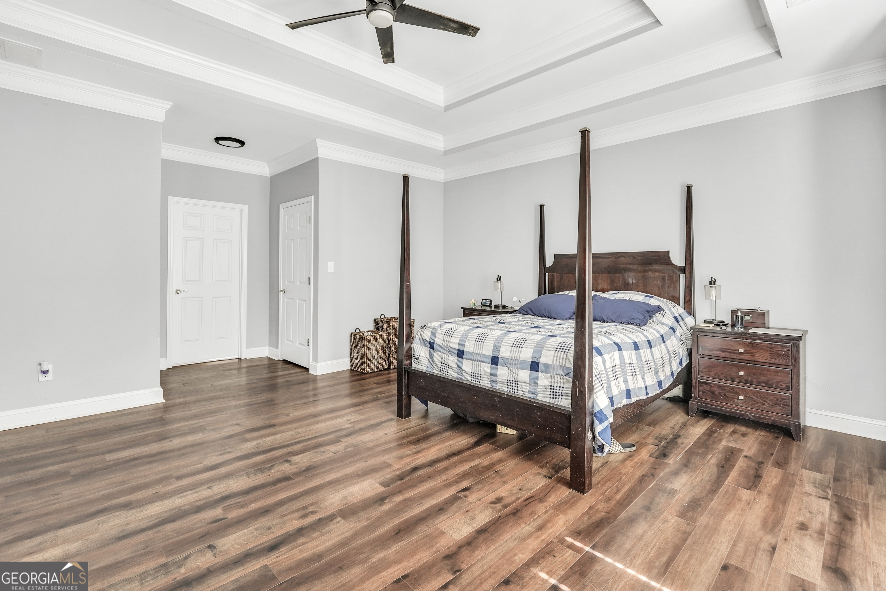 261 Highway 85 Connector Brooks, GA 30205 - Photo 26 of 73 a bedroom with a bed and wooden floor