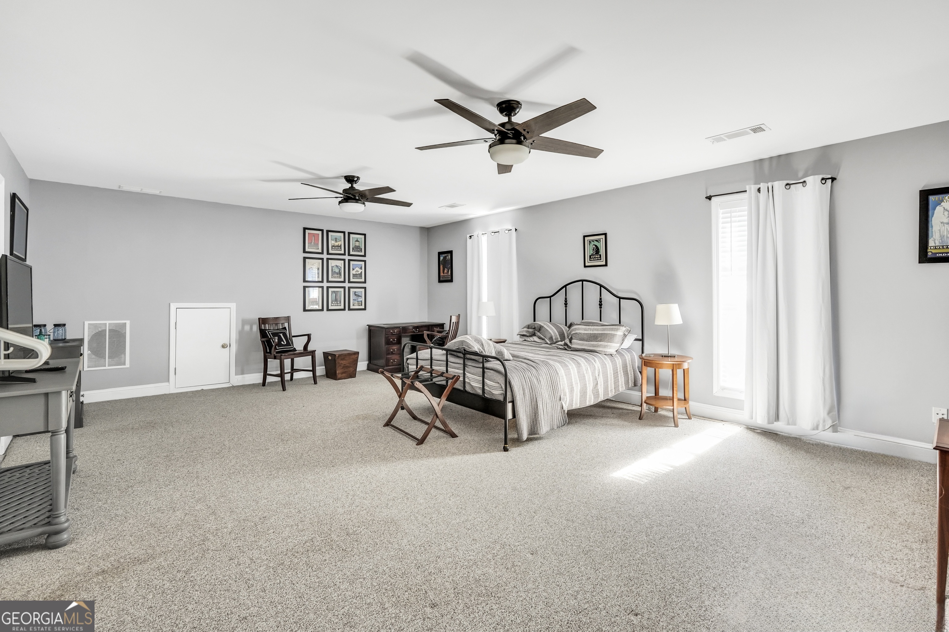 261 Highway 85 Connector Brooks, GA 30205 - Photo 33 of 73 a bedroom with furniture and a window