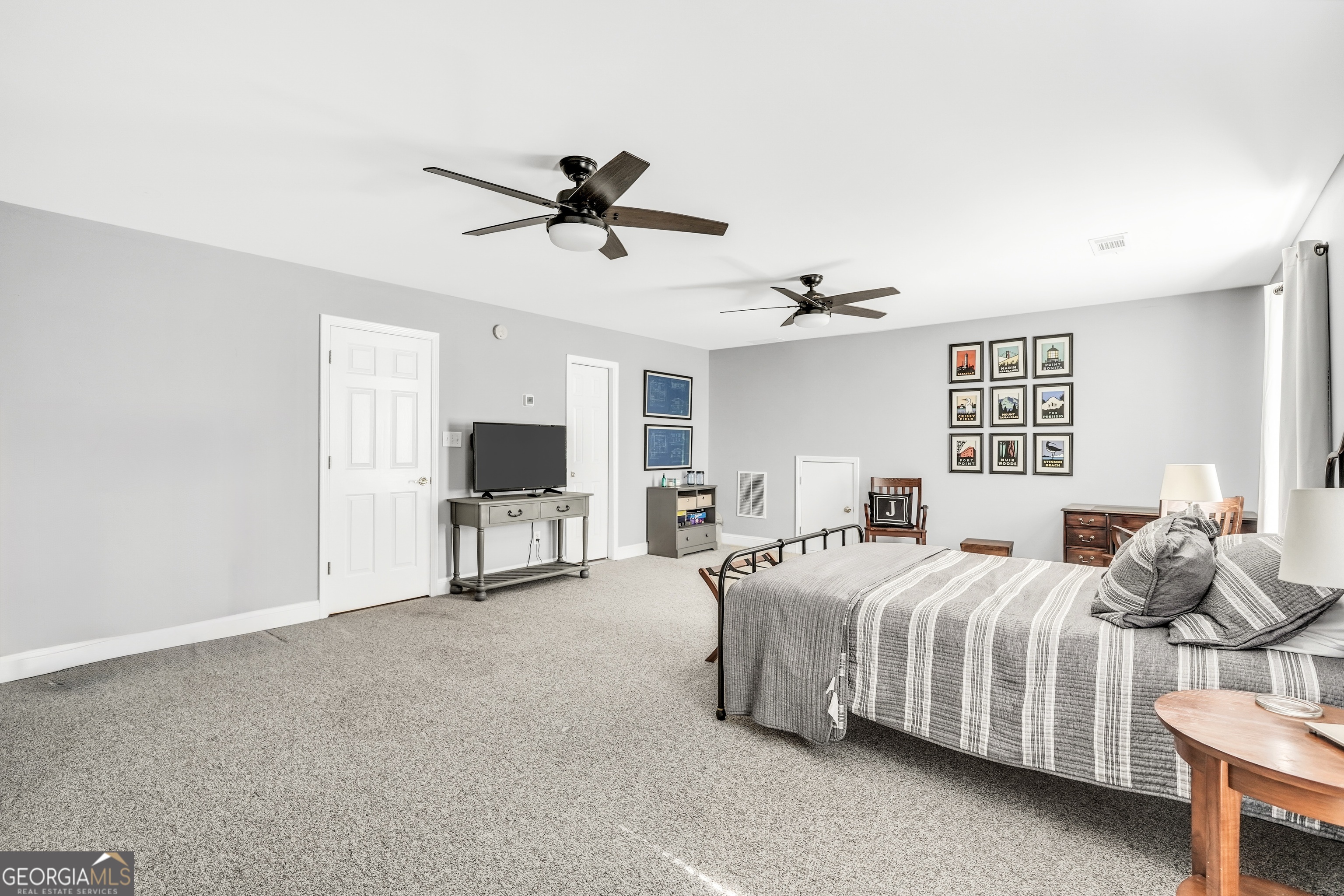 261 Highway 85 Connector Brooks, GA 30205 - Photo 34 of 73 a bedroom with a bed and a chair