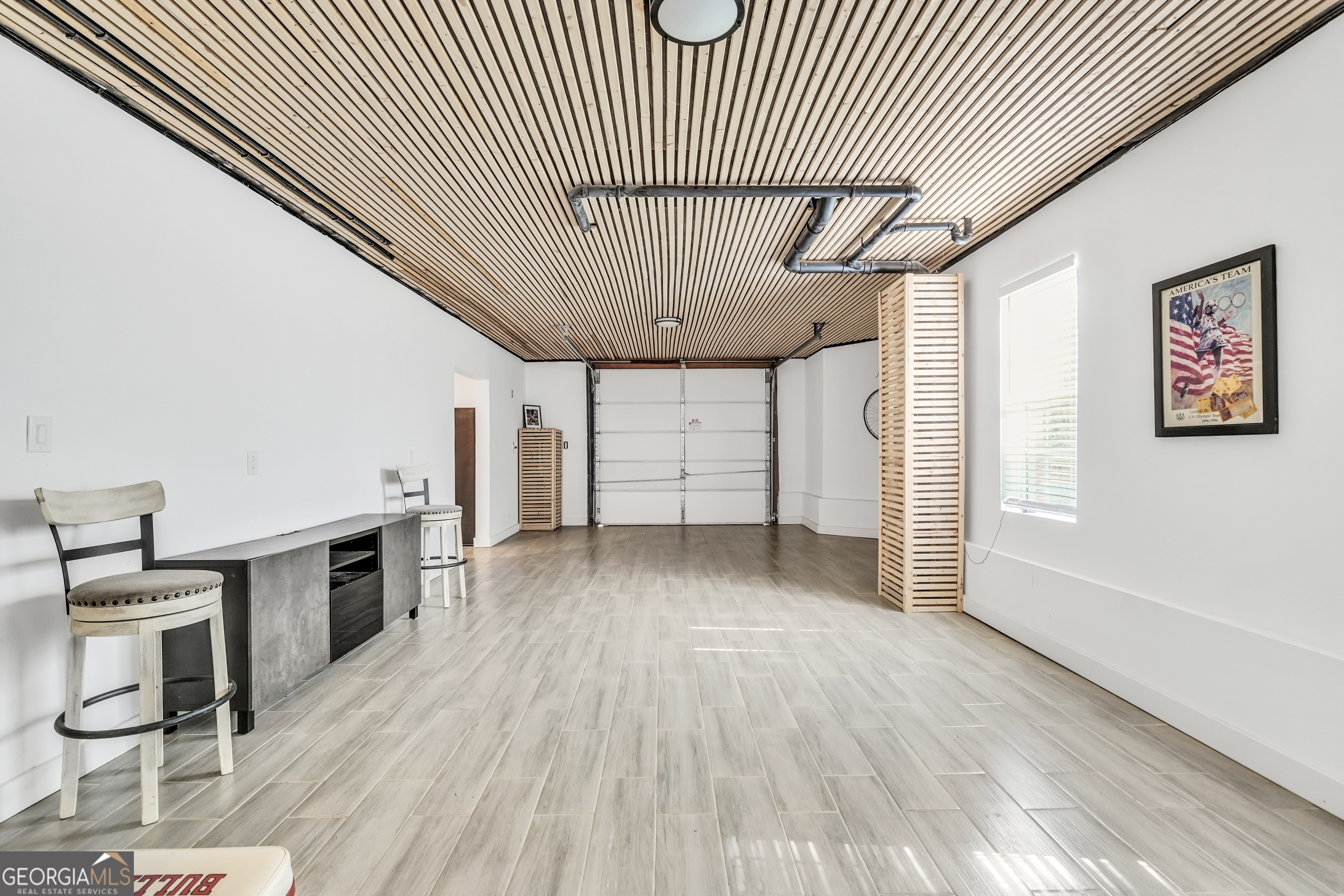 261 Highway 85 Connector Brooks, GA 30205 - Photo 53 of 73 a view of a livingroom with an entryway and wooden floor