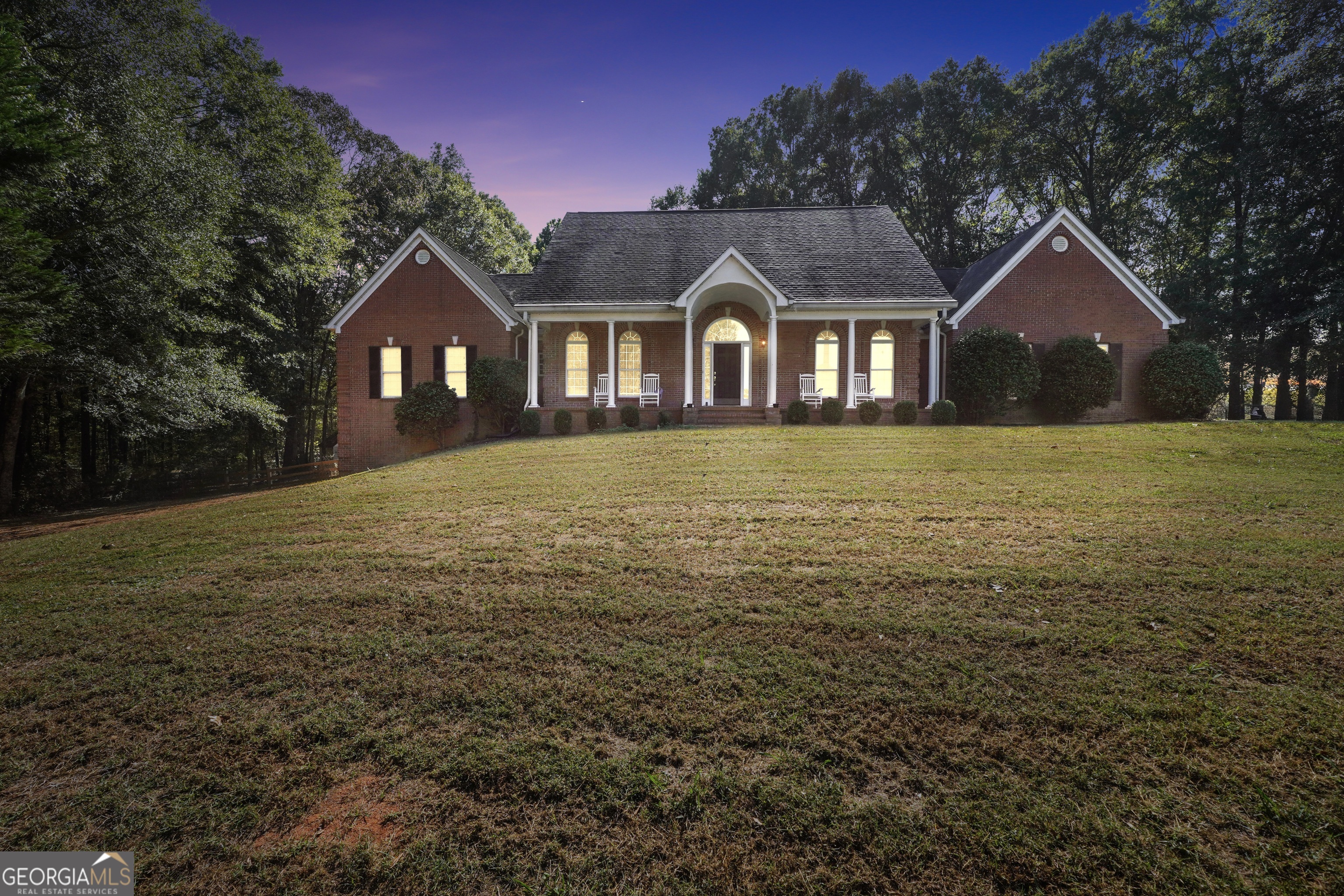 261 Highway 85 Connector Brooks, GA 30205 - Photo 63 of 73 a front view of house with yard and green space