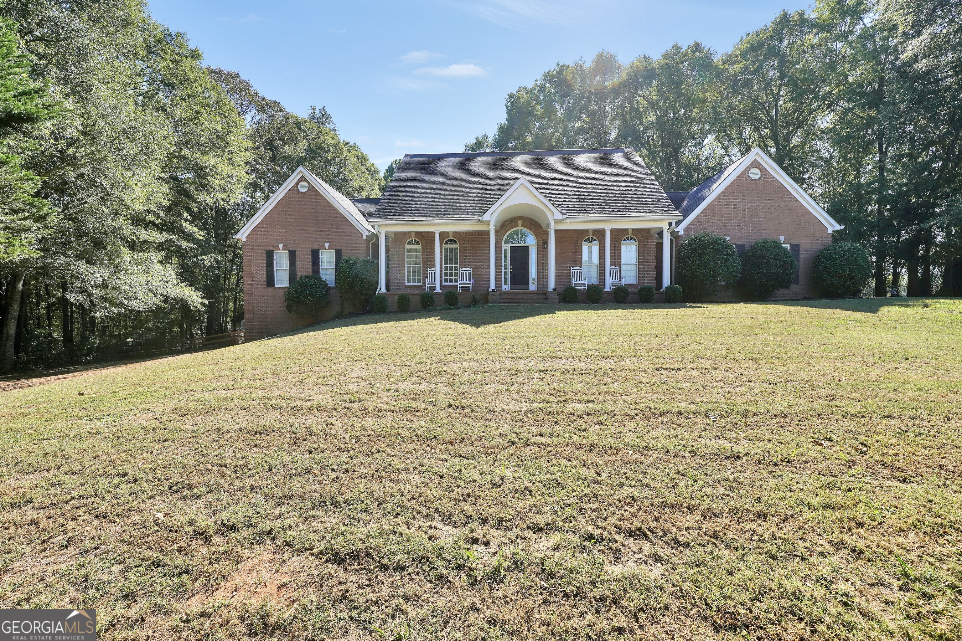 261 Highway 85 Connector Brooks, GA 30205 - Photo 70 of 73 a front view of a house with yard and mountain view