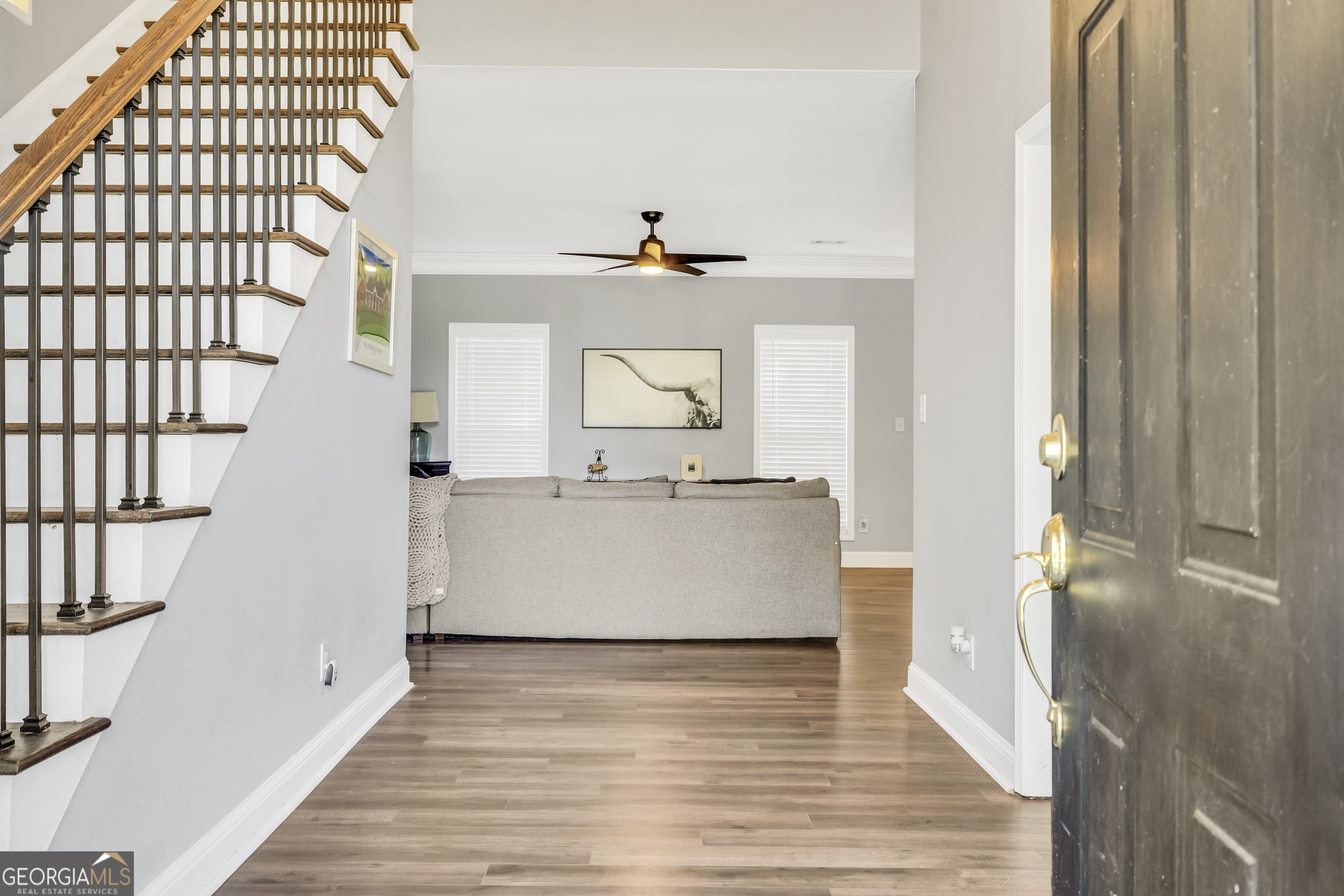261 Highway 85 Connector Brooks, GA 30205 - Photo 9 of 73 a view of a kitchen with wooden floor and staircase