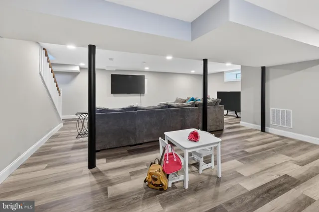 a living room with a couch and a table