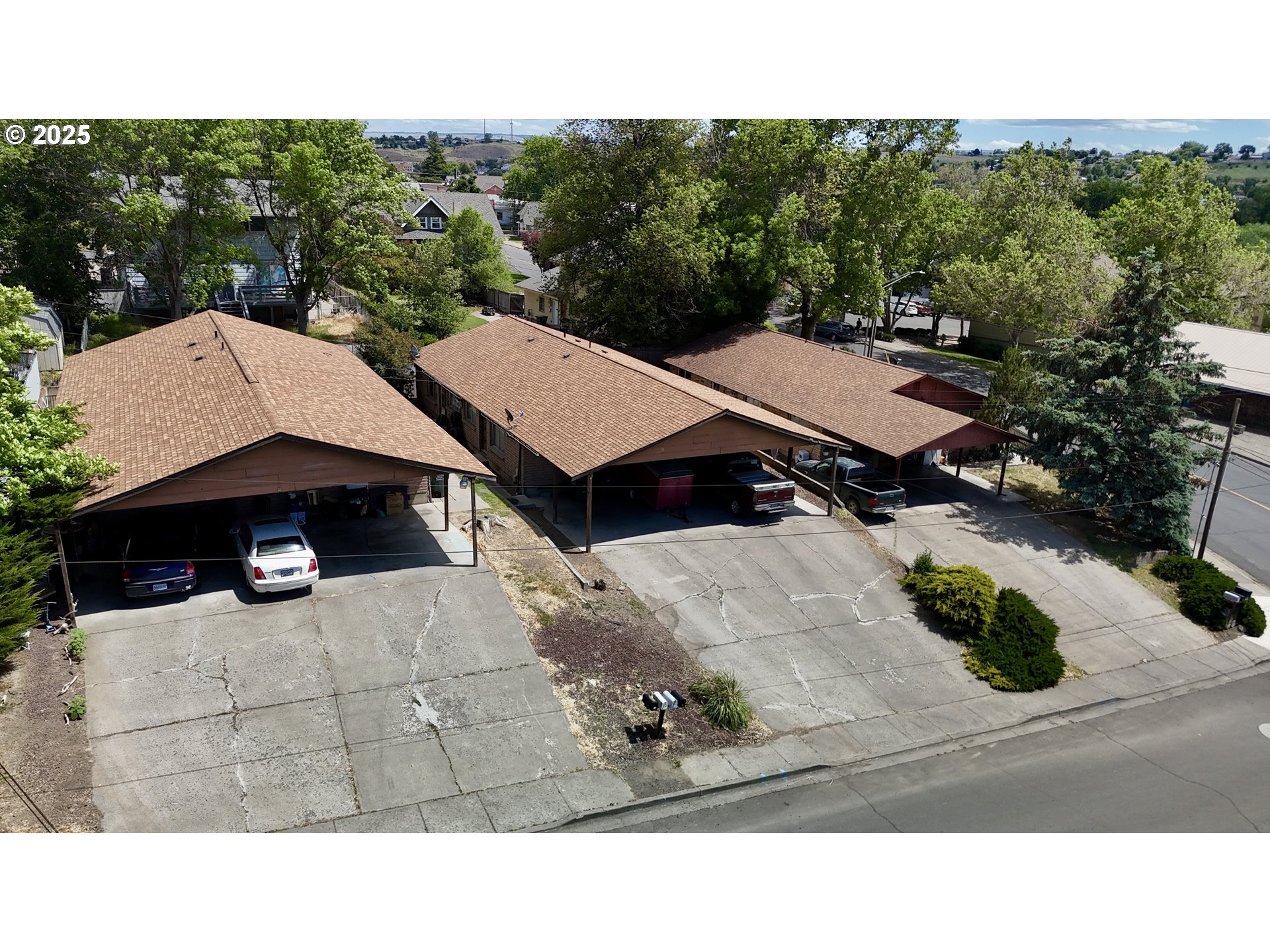 206-208 Northwest 14th Street Pendleton, OR 97801 - Photo 1 of 5 a black and white photo of a street