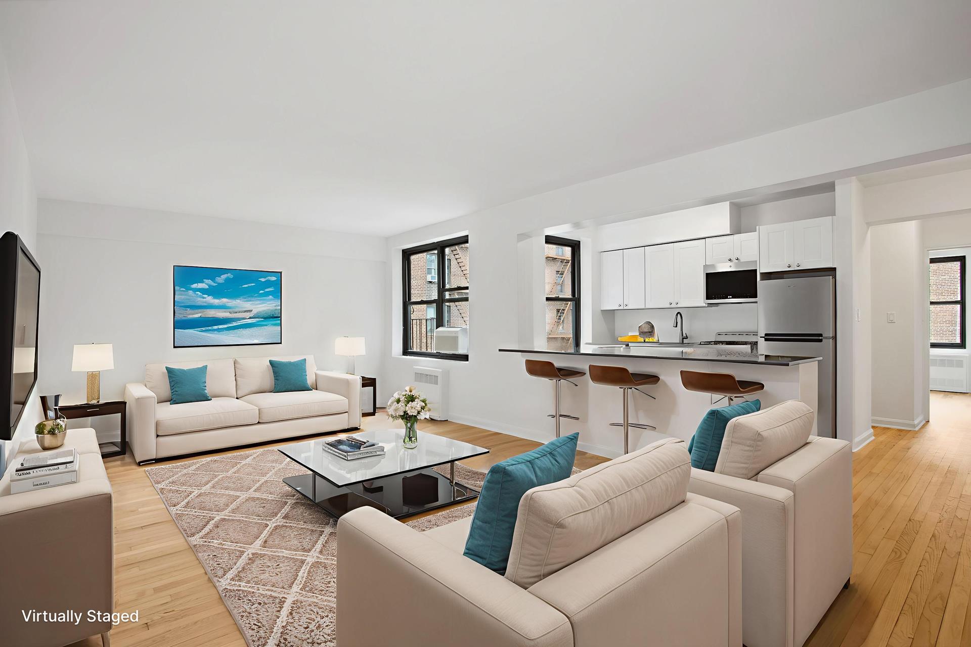 4489 Broadway, Unit 5E Manhattan, NY 10040 - Photo 9 of 13 a living room with furniture and view kitchen