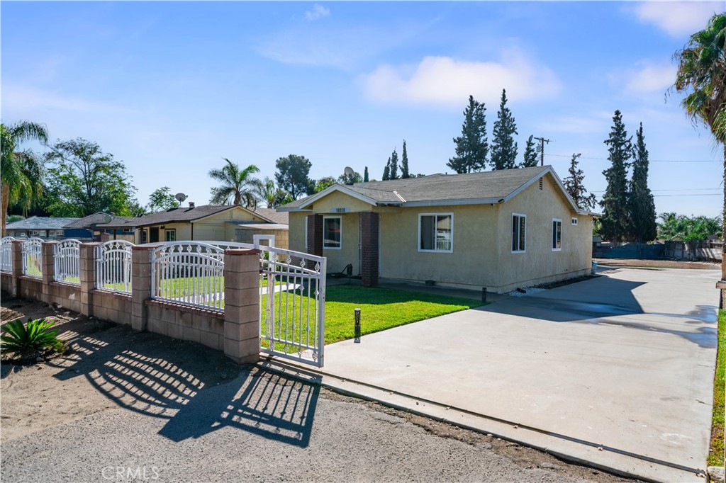 18859 6th Street Bloomington, CA 92316 - Photo 2 of 31 a view of a house with backyard and sitting area