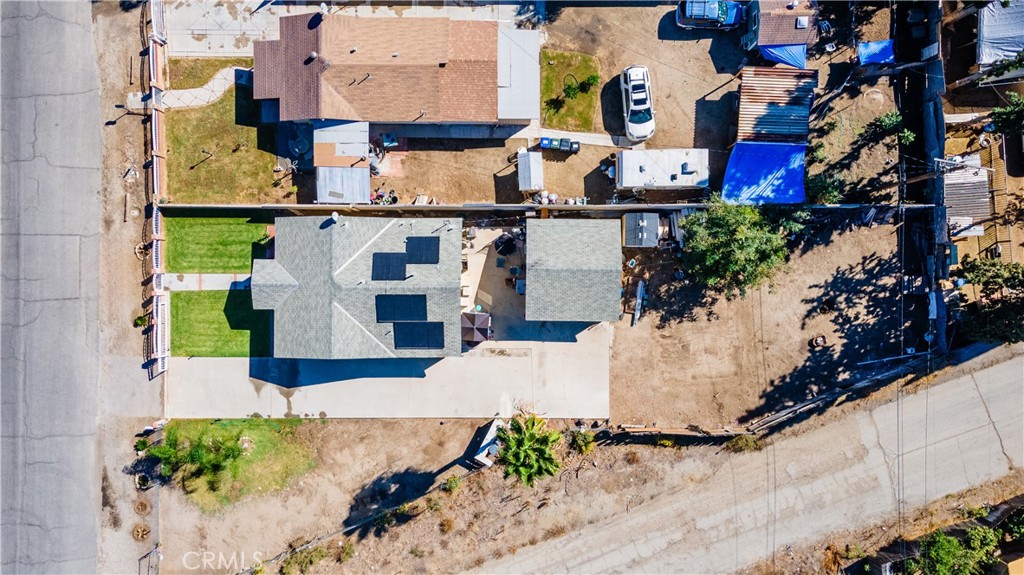 18859 6th Street Bloomington, CA 92316 - Photo 31 of 31 an aerial view of multiple houses with outdoor space