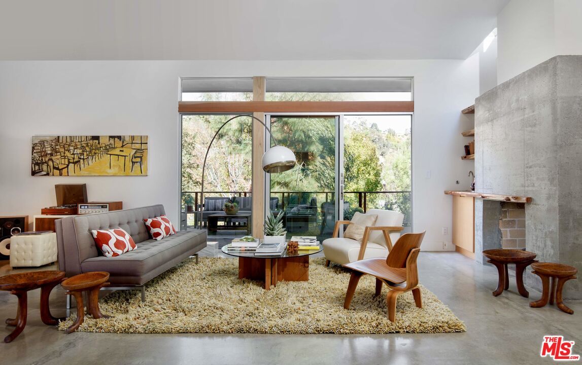 7500 Devista Drive Los Angeles, CA 90046 - Photo 1 of 41 a living room with furniture and a large window