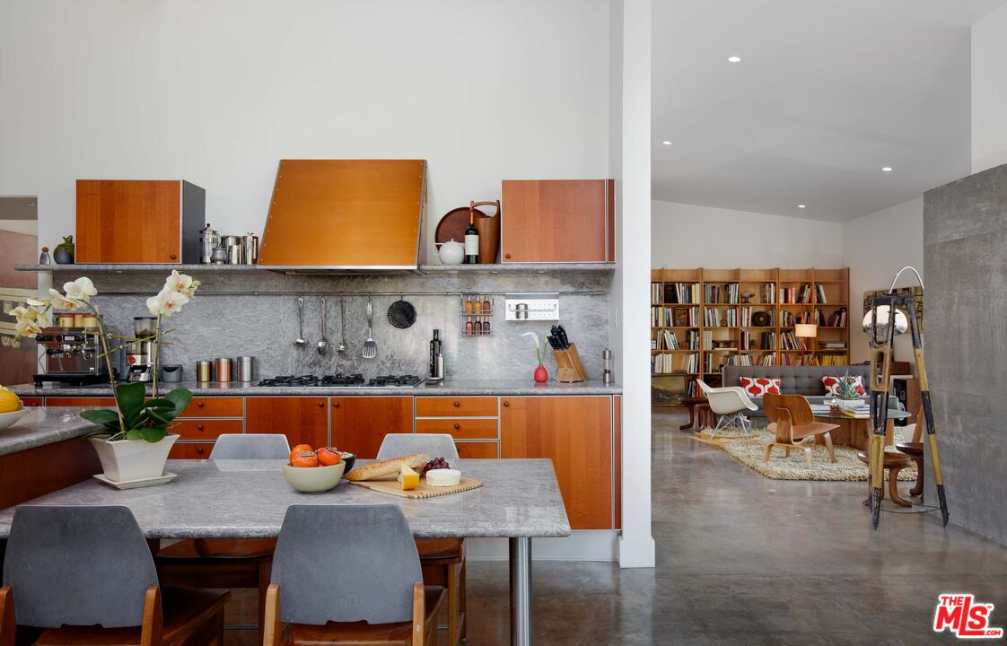 7500 Devista Drive Los Angeles, CA 90046 - Photo 18 of 41 a view of kitchen and dining room with wooden floor
