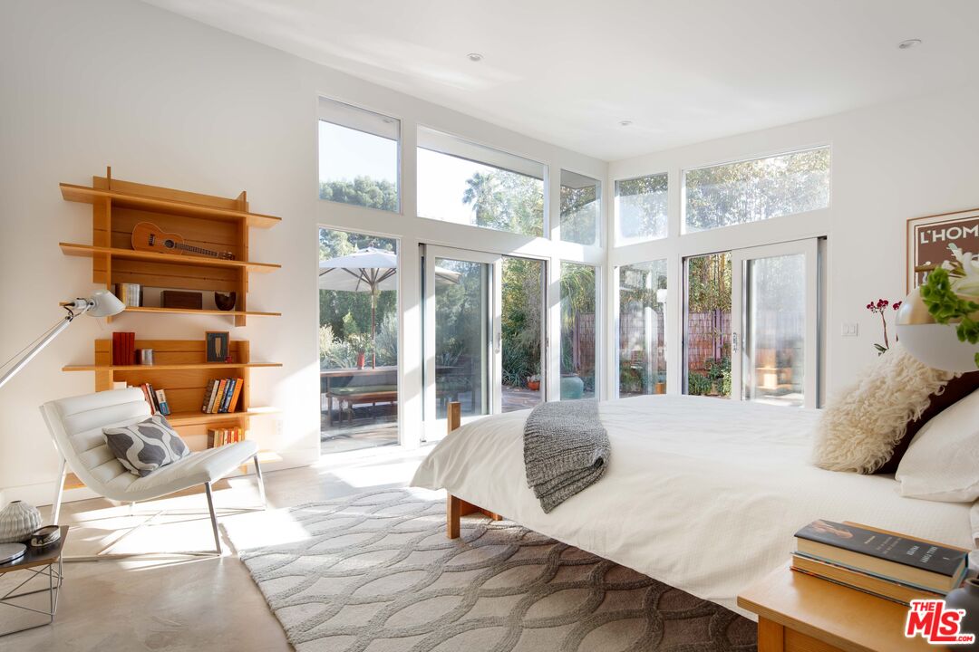 7500 Devista Drive Los Angeles, CA 90046 - Photo 21 of 41 a living room with furniture and large windows