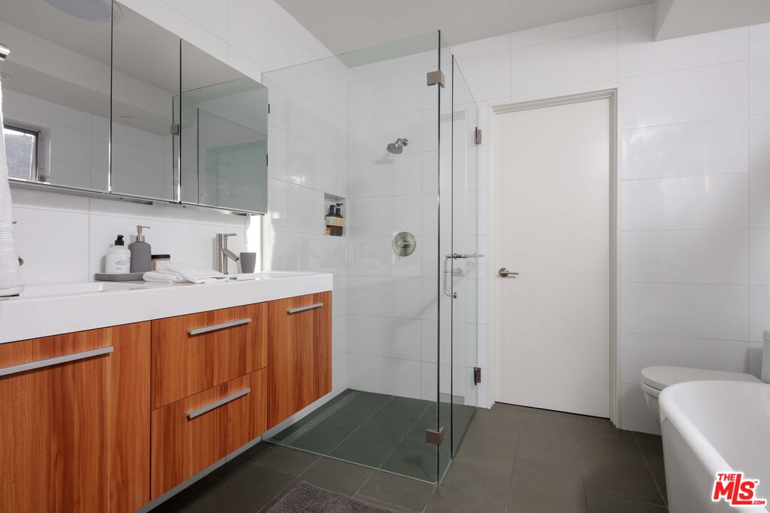 7500 Devista Drive Los Angeles, CA 90046 - Photo 24 of 41 a bathroom with a sink a toilet and shower
