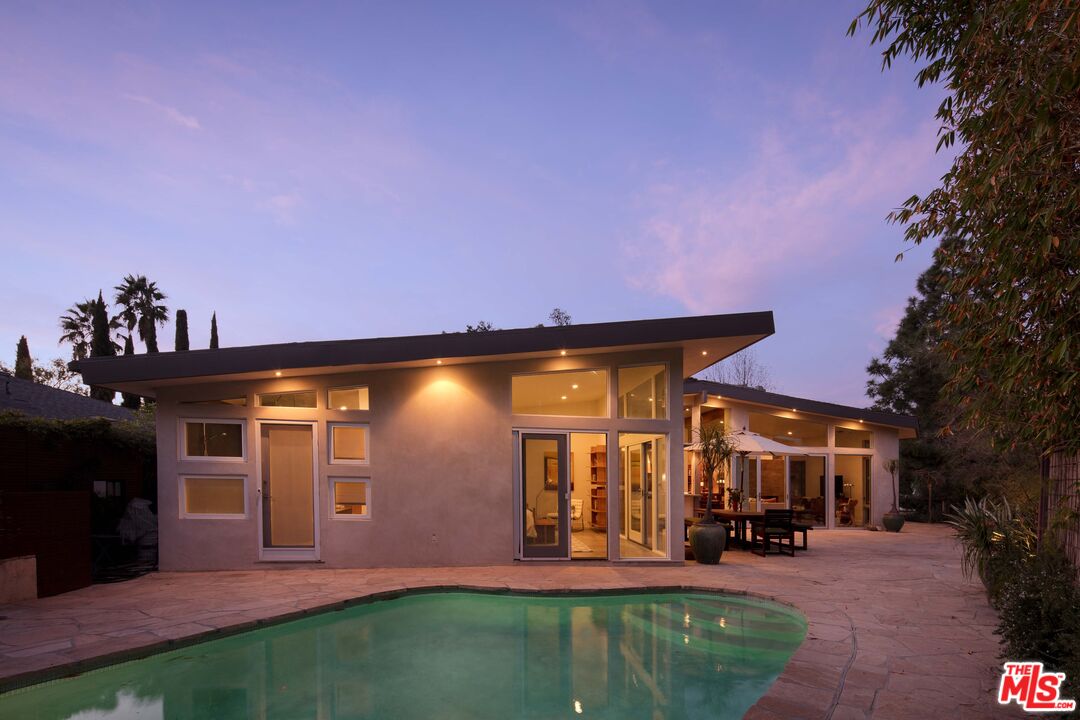 7500 Devista Drive Los Angeles, CA 90046 - Photo 4 of 41 a front view of a house with a yard