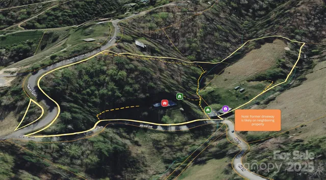 an aerial view of a highlighted house