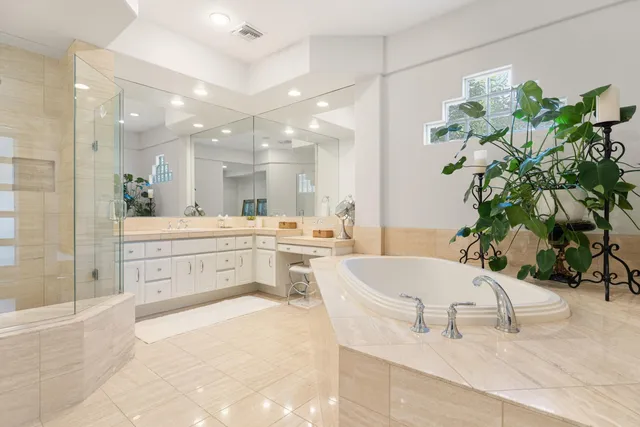 a view of a swimming pool with an outdoor seating and a yard