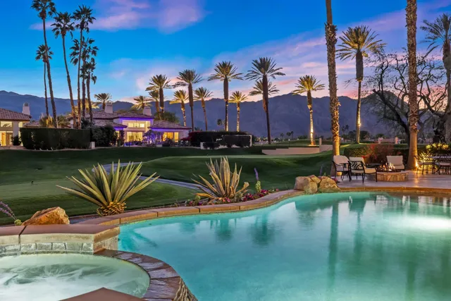 a view of a lake with a house