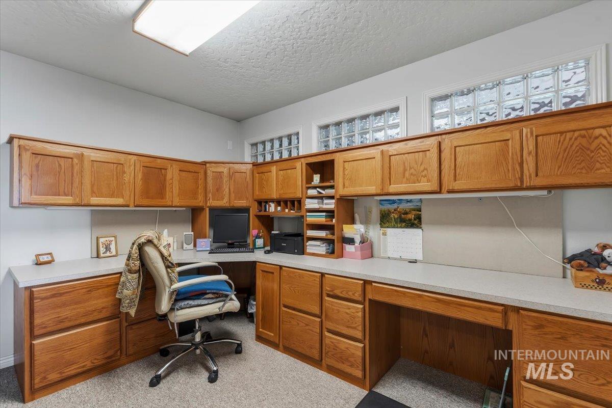 2331 Gulley Road Homedale, ID 83628 - Photo 27 of 46 Dedicated office space featuring extensive built-in wood cabinetry and countertops