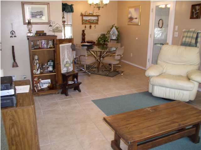 6172 Barnes Road Crestview, FL 32536 - Photo 3 of 8 a living room with furniture rug and lamp
