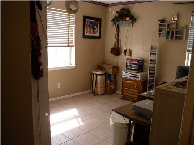 6172 Barnes Road Crestview, FL 32536 - Photo 5 of 8 a room with furniture a air conditioner vent and a window