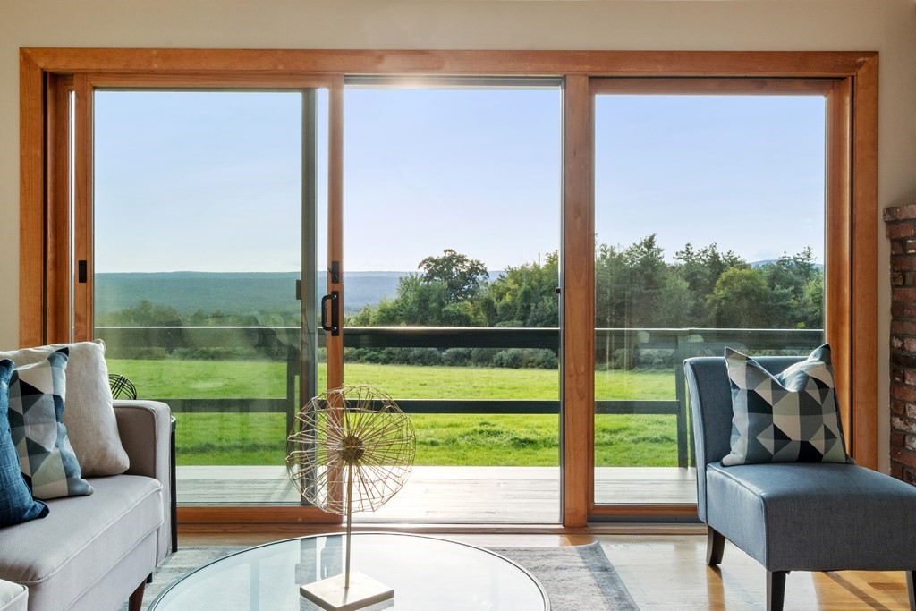 36 Osgood Road Sterling, MA 01564 - Photo 22 of 40 a view of a porch with furniture and garden