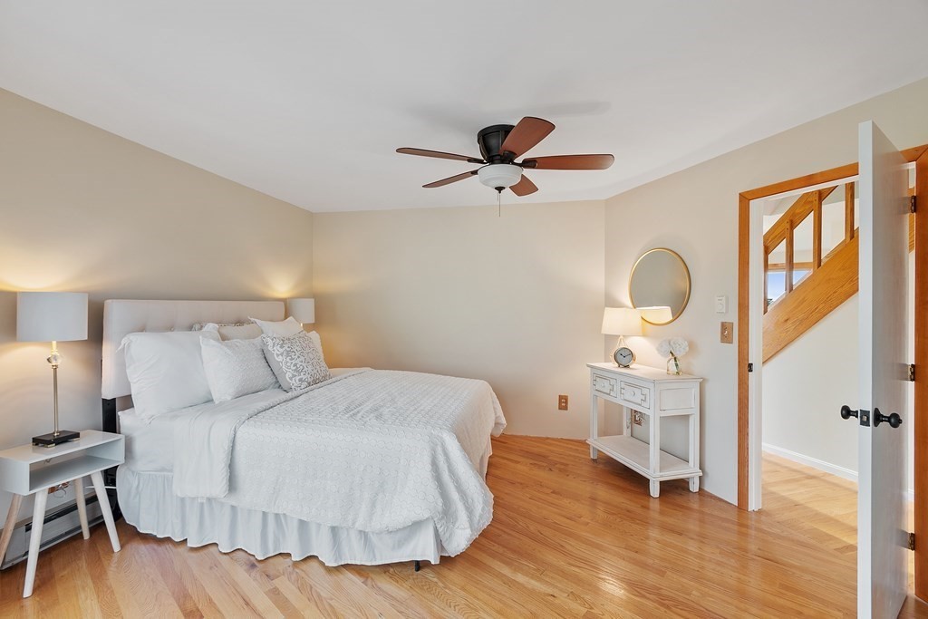 36 Osgood Road Sterling, MA 01564 - Photo 25 of 40 a bedroom with a bed and wooden floor