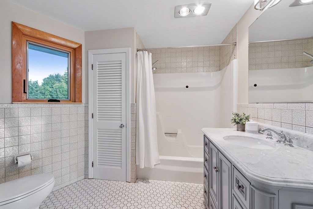 36 Osgood Road Sterling, MA 01564 - Photo 26 of 40 a bathroom with a sink a toilet and shower