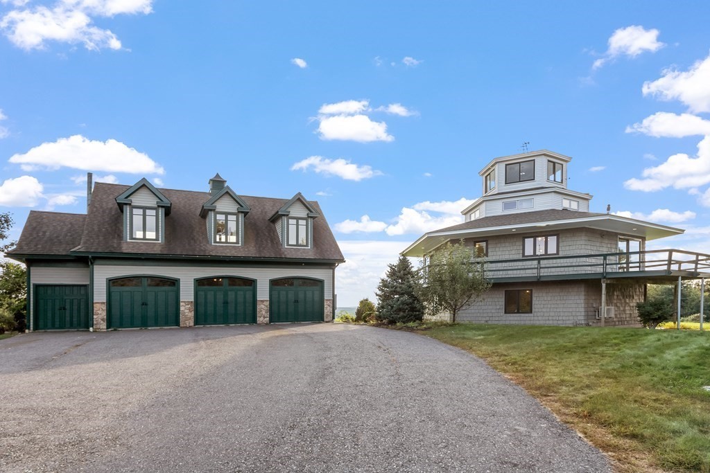 36 Osgood Road Sterling, MA 01564 - Photo 31 of 40 a front view of a house with a yard