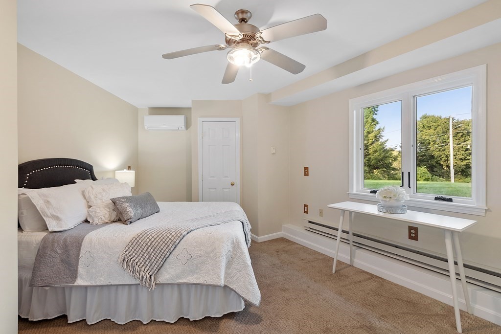 36 Osgood Road Sterling, MA 01564 - Photo 6 of 40 a bedroom with a bed and a window