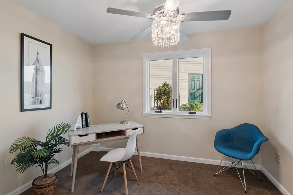 36 Osgood Road Sterling, MA 01564 - Photo 9 of 40 a view of a dining room with furniture window and wooden floor