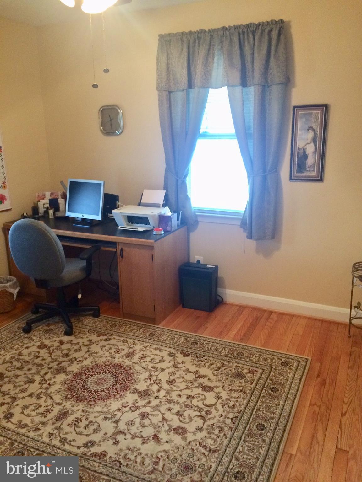 1248 June Road Baltimore, MD 21227 - Photo 7 of 18 a workspace room with furniture and window