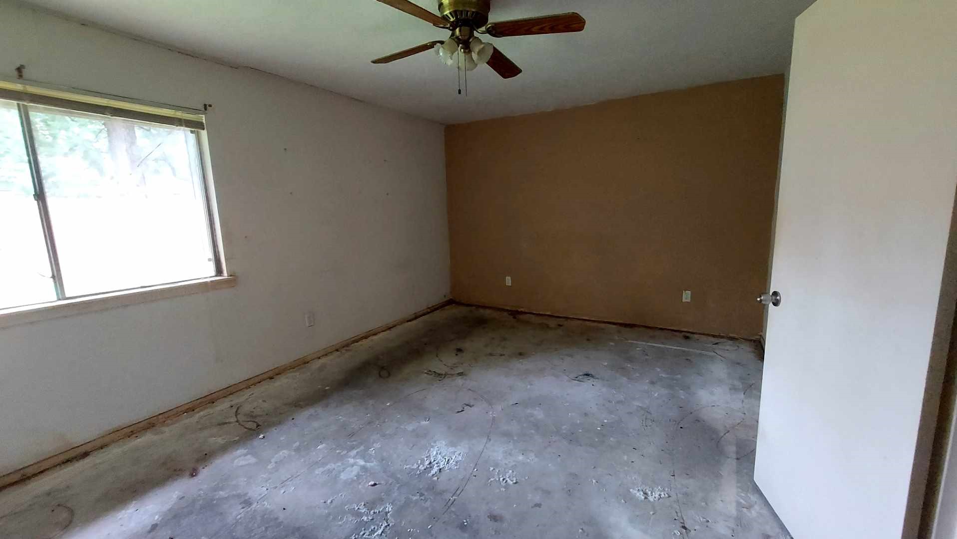 4411 Monteith Drive Spring, TX 77373 - Photo 14 of 15 an empty room with a window and a fan