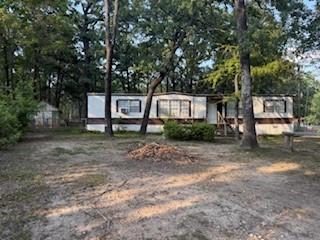 11257 Cedar Drive Mabank, TX 75156 - Photo 8 of 8 a front view of a house with garden