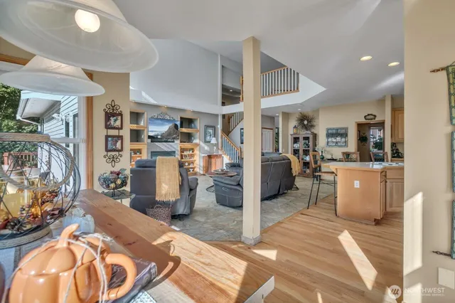 a view of a livingroom with workspace and a living room