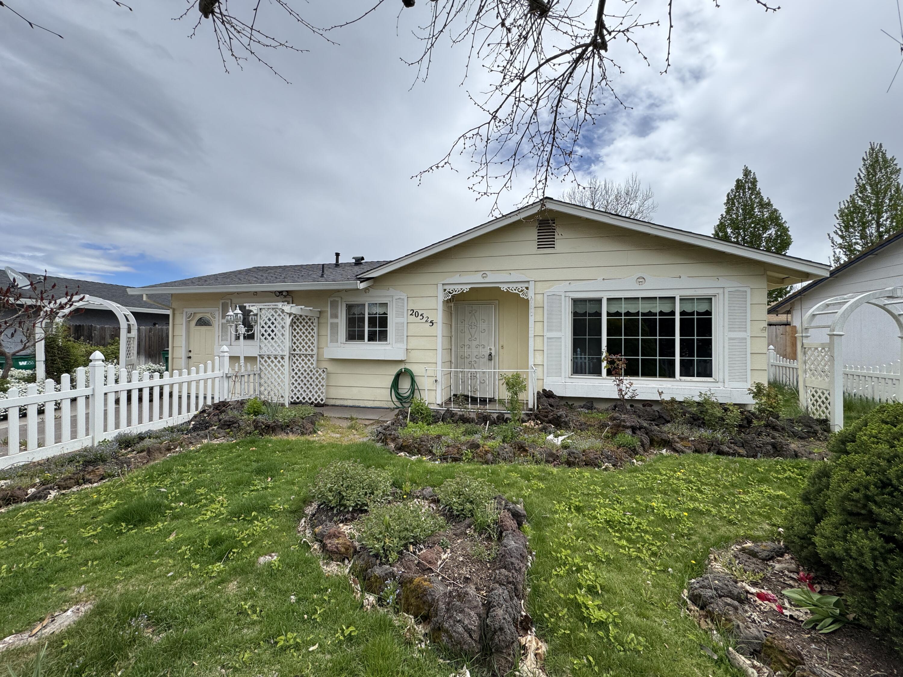 20525 Hudson Street Burney, CA 96013 - Photo 2 of 58 a house view with a garden space