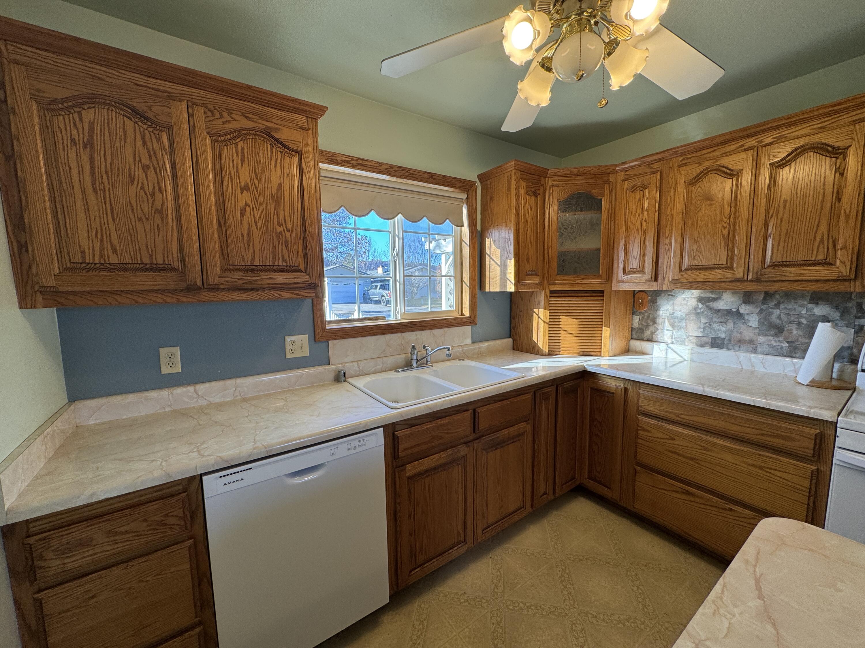 20525 Hudson Street Burney, CA 96013 - Photo 21 of 58 a kitchen with a sink cabinets and window