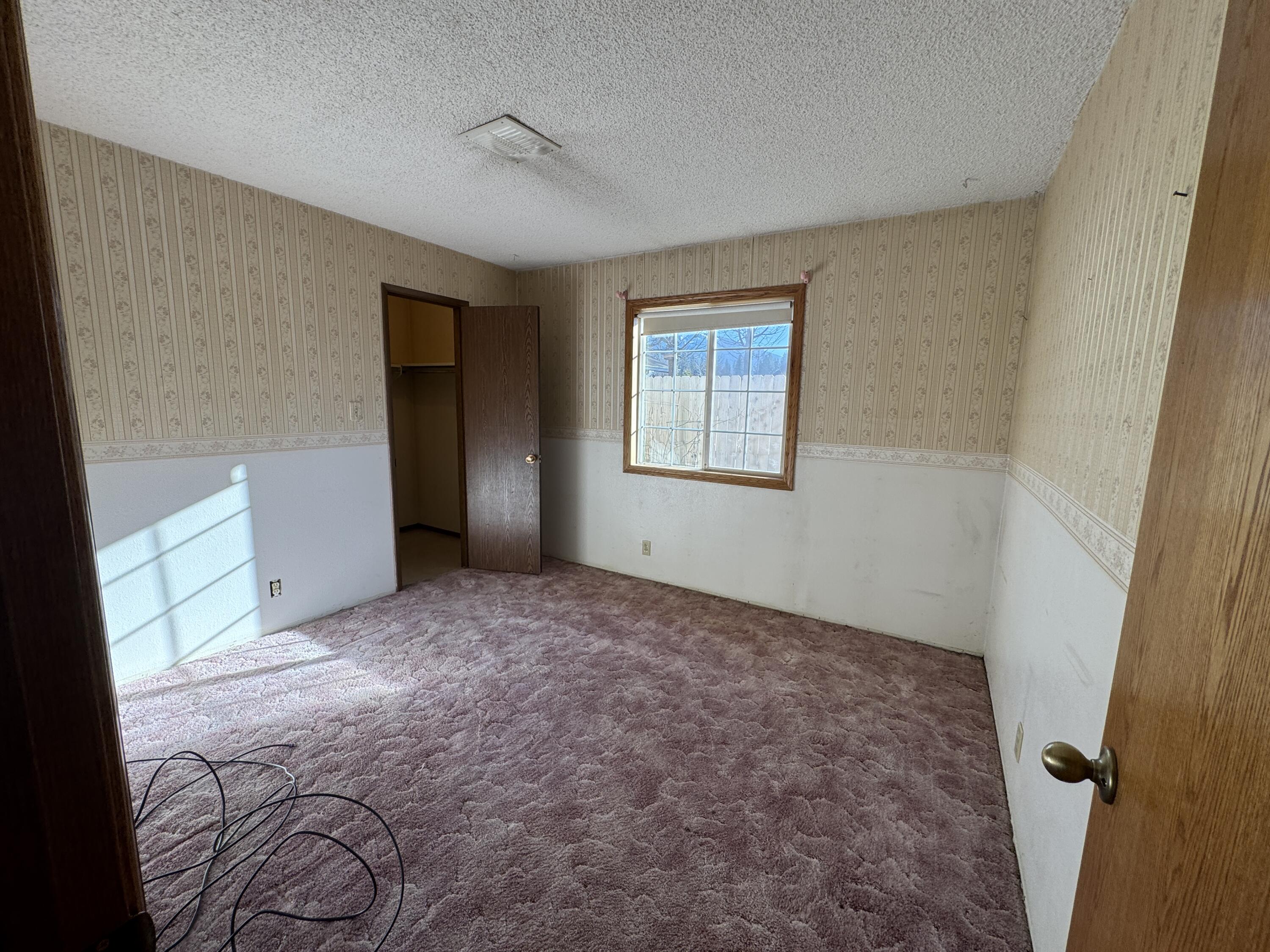 20525 Hudson Street Burney, CA 96013 - Photo 34 of 58 an empty room with windows