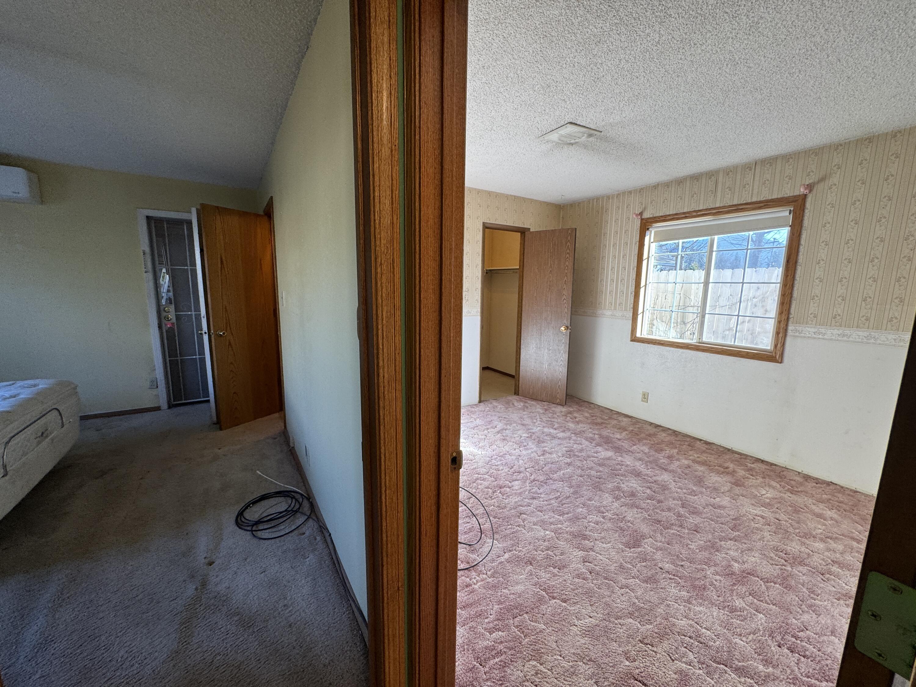 20525 Hudson Street Burney, CA 96013 - Photo 37 of 58 an empty room with windows