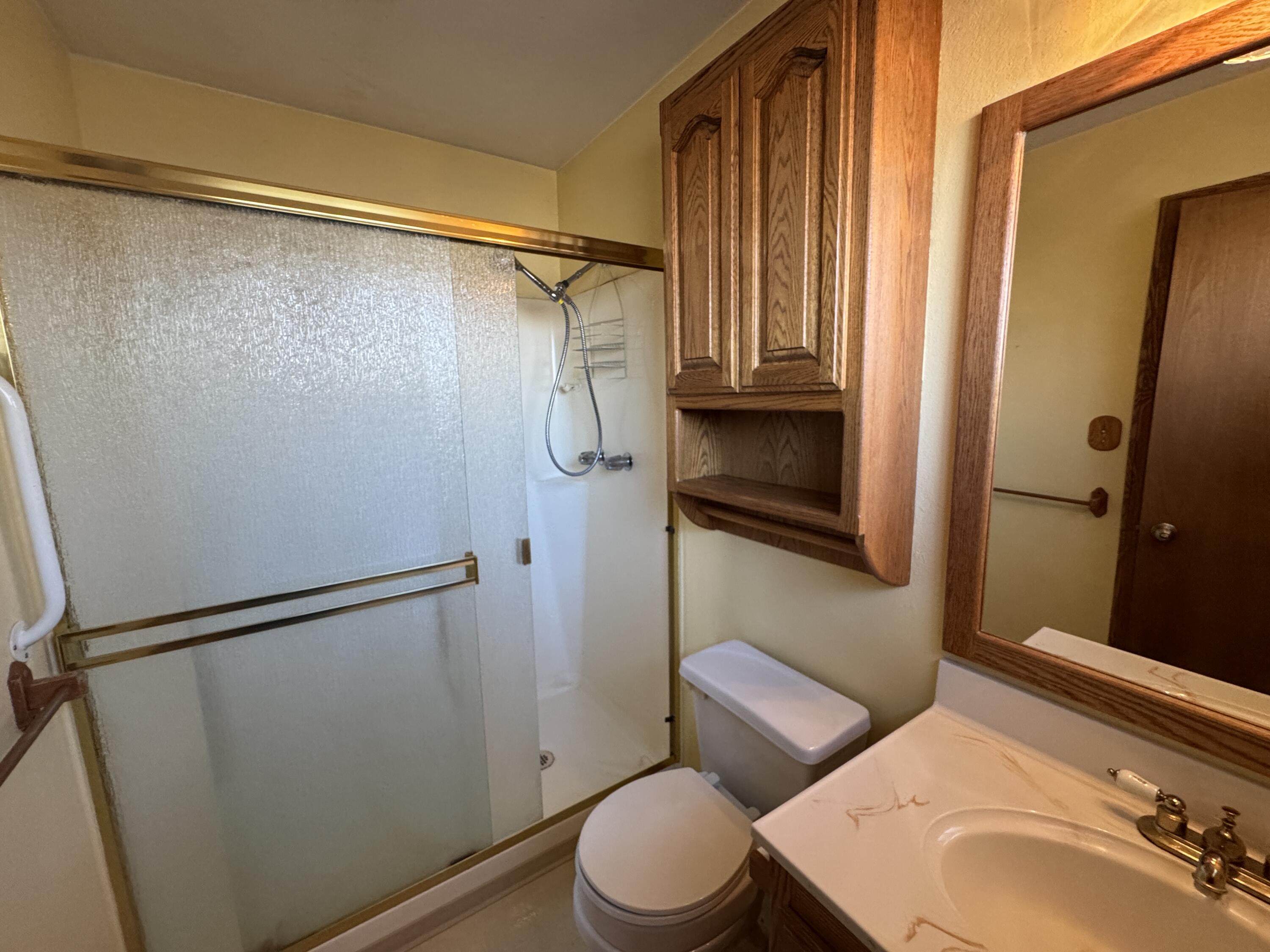 20525 Hudson Street Burney, CA 96013 - Photo 42 of 58 a bathroom with a sink toilet and shower