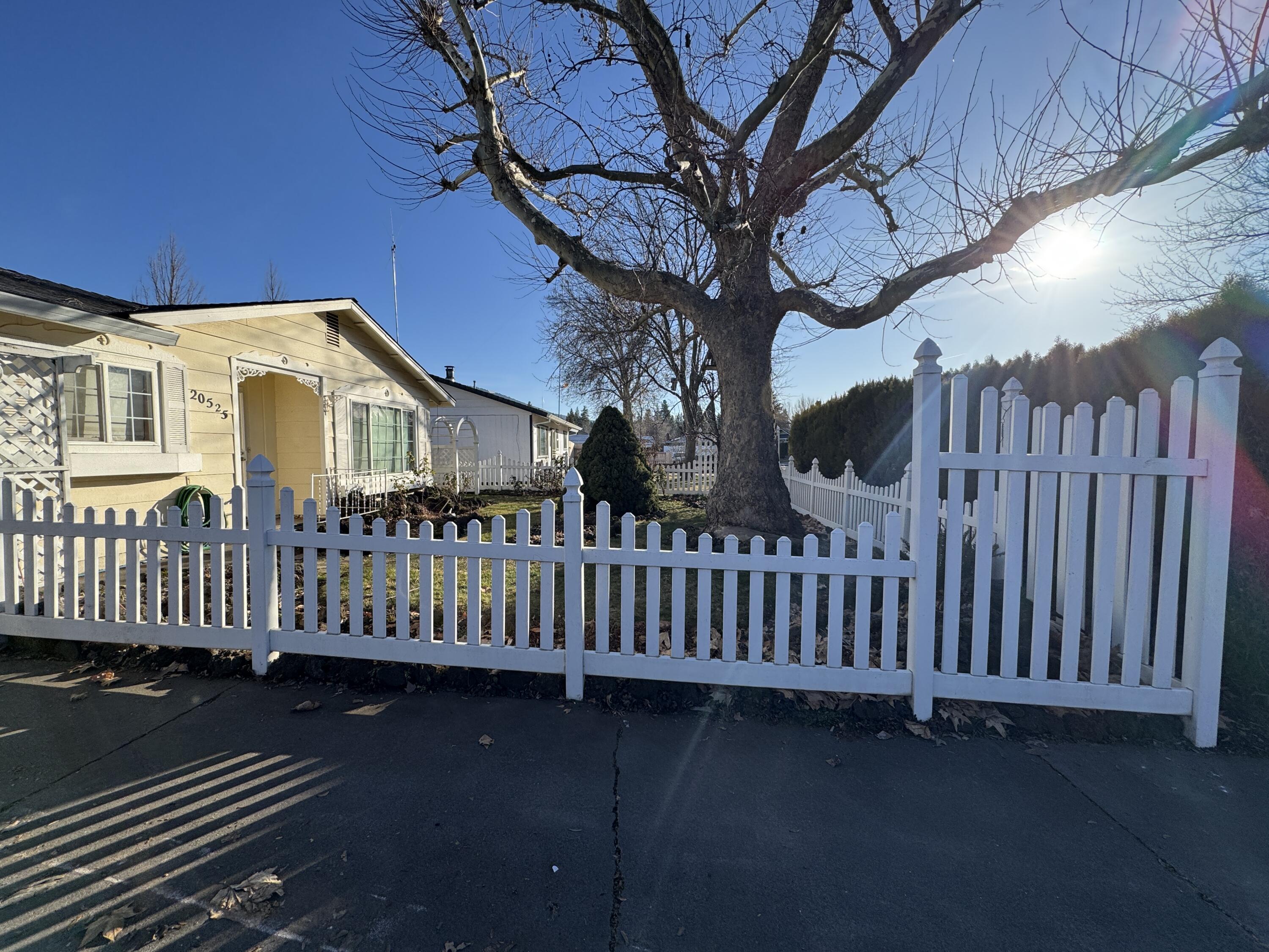 20525 Hudson Street Burney, CA 96013 - Photo 55 of 58 a front view of a house with a garden