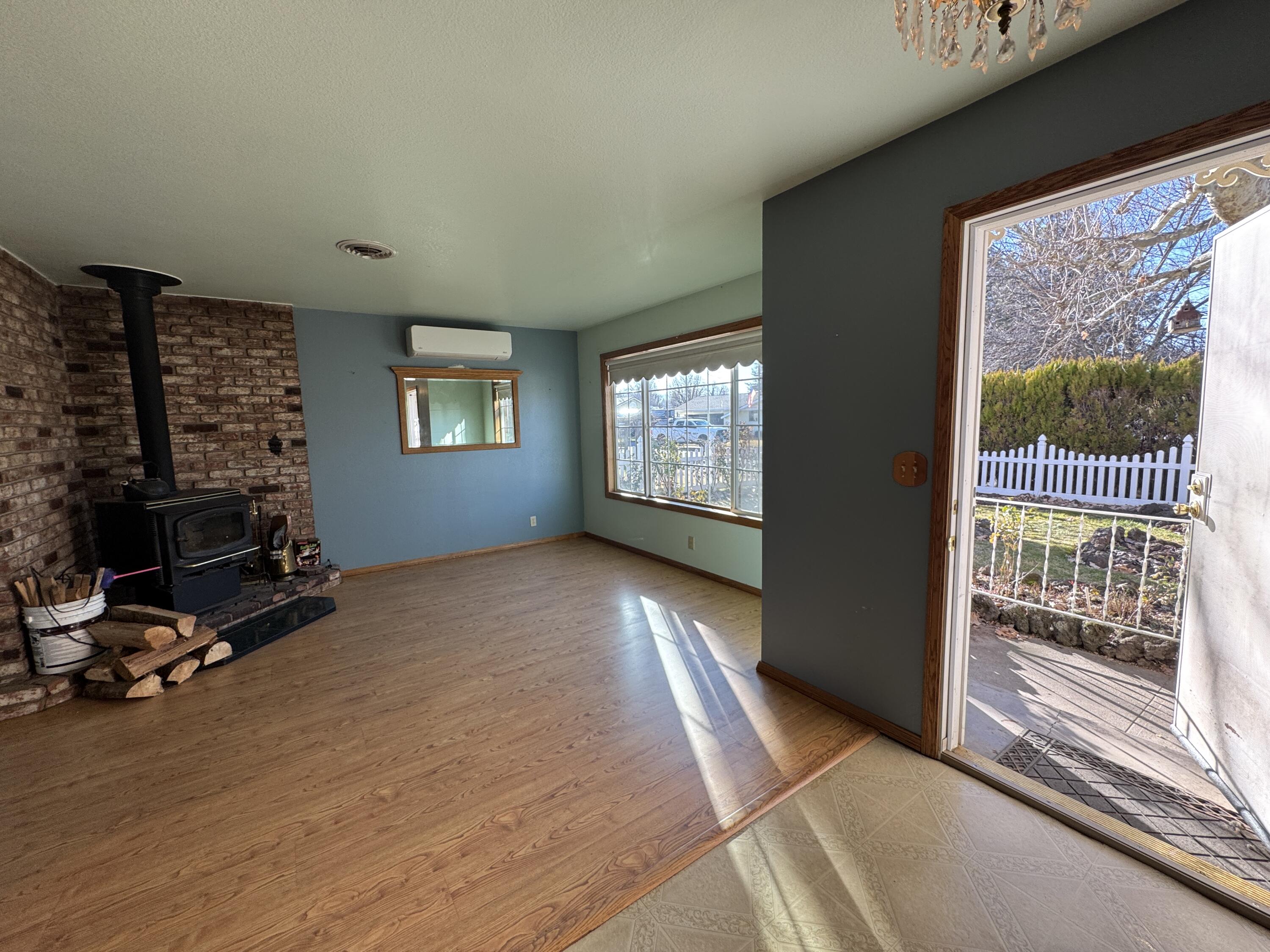 20525 Hudson Street Burney, CA 96013 - Photo 10 of 58 a view of an empty room with a window and storage