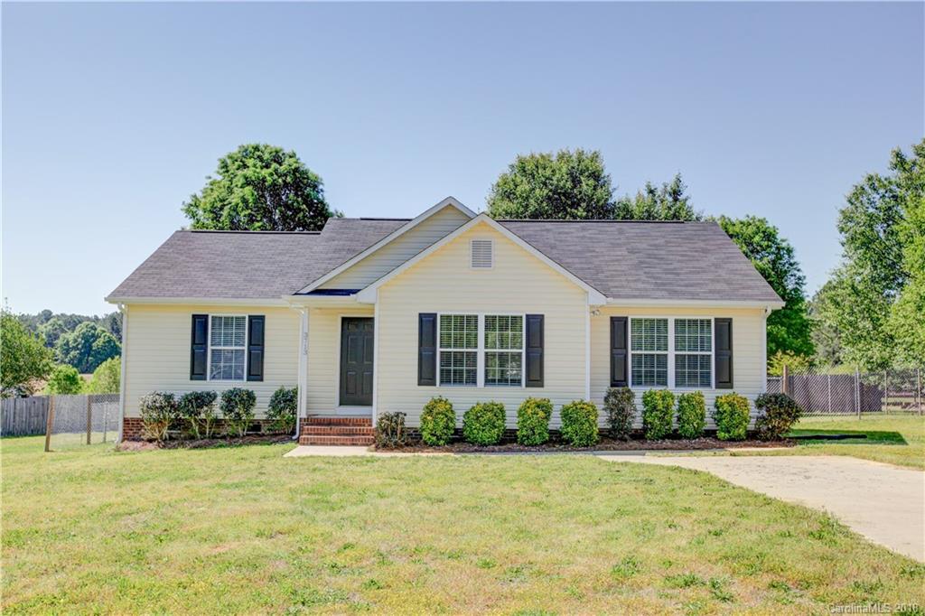 3713 Austin Road Monroe, NC 28112 - Photo 1 of 19 a view of a house with backyard and a tree