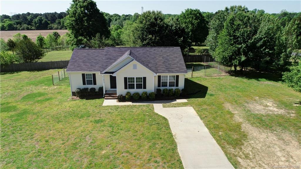 3713 Austin Road Monroe, NC 28112 - Photo 2 of 19 a house view with a garden space