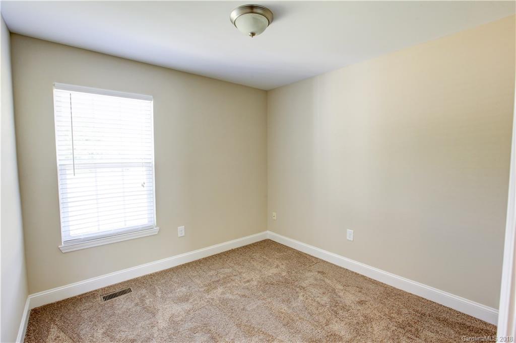 3713 Austin Road Monroe, NC 28112 - Photo 18 of 19 an empty room with a window