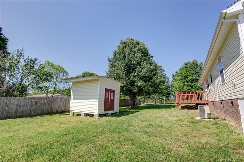 3713 Austin Road Monroe, NC 28112 - Photo 5 of 19 front view of a house with a yard