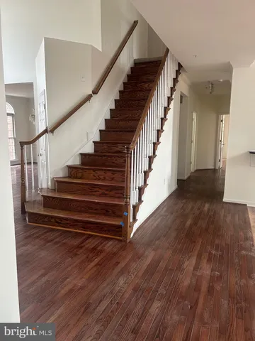 a view of entryway with wooden floor